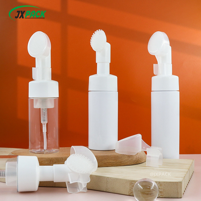 Bottiglia di pompa in schiuma bianca chiara da 40 ml di forma rotonda con spazzolino detergente in silicone